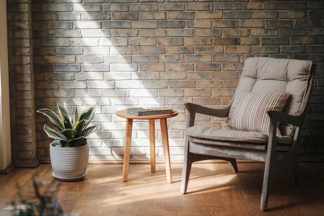 A peaceful corner in a home with natural light and comfortable seating