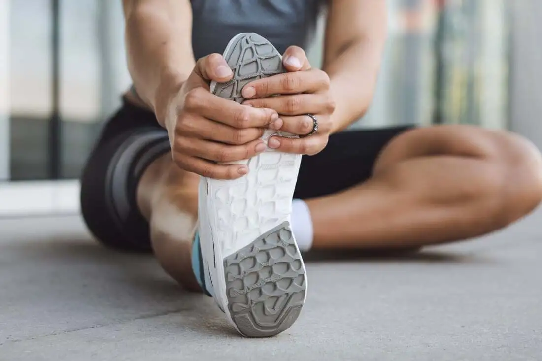 A person performing a stretching exercise