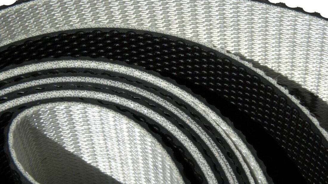 Close-up photo of treadmill belt with visible cushioning system