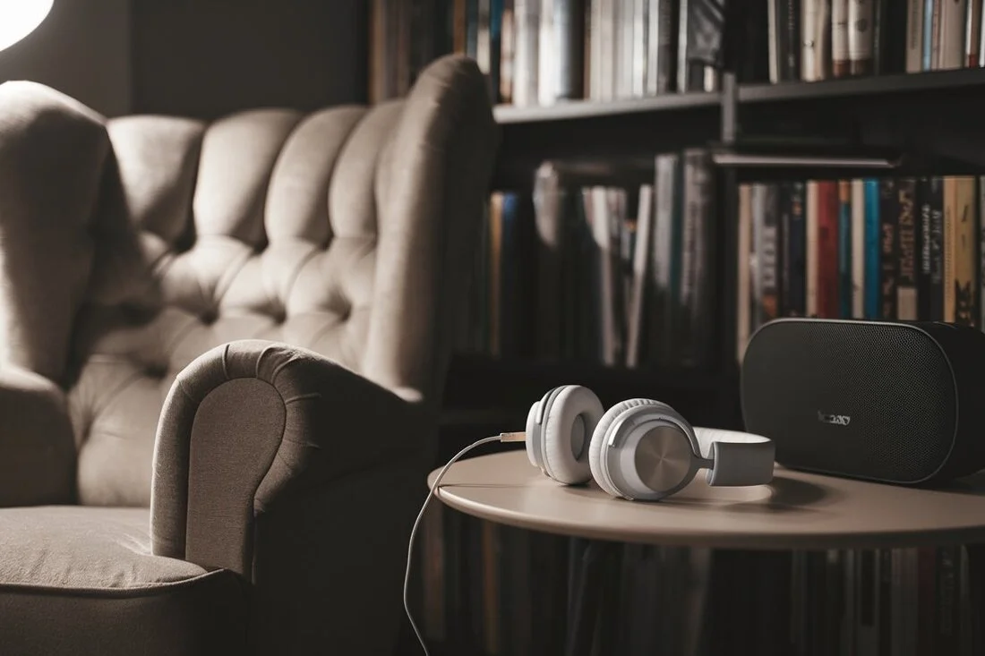 Headphones or speakers in a cozy setting