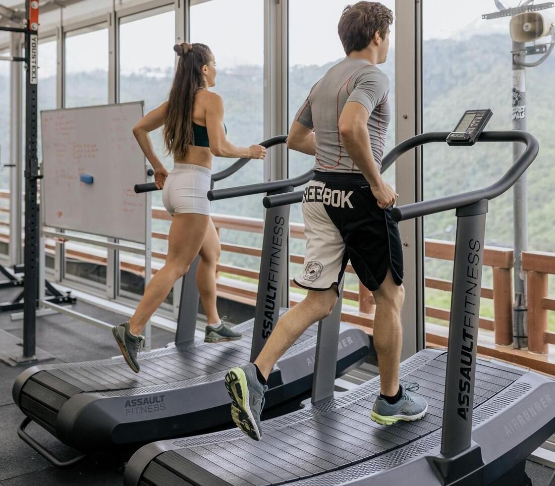 Man and Woman on a Curved Treadmill