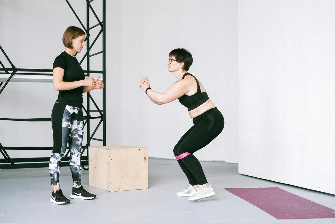 Person Doing Shallow Squat with Poor Form