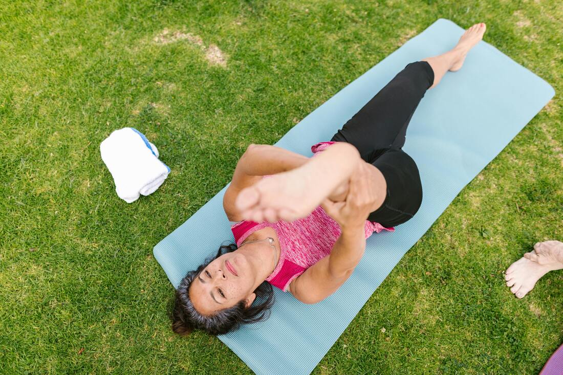 Person Doing Straight Leg Raise Exercise