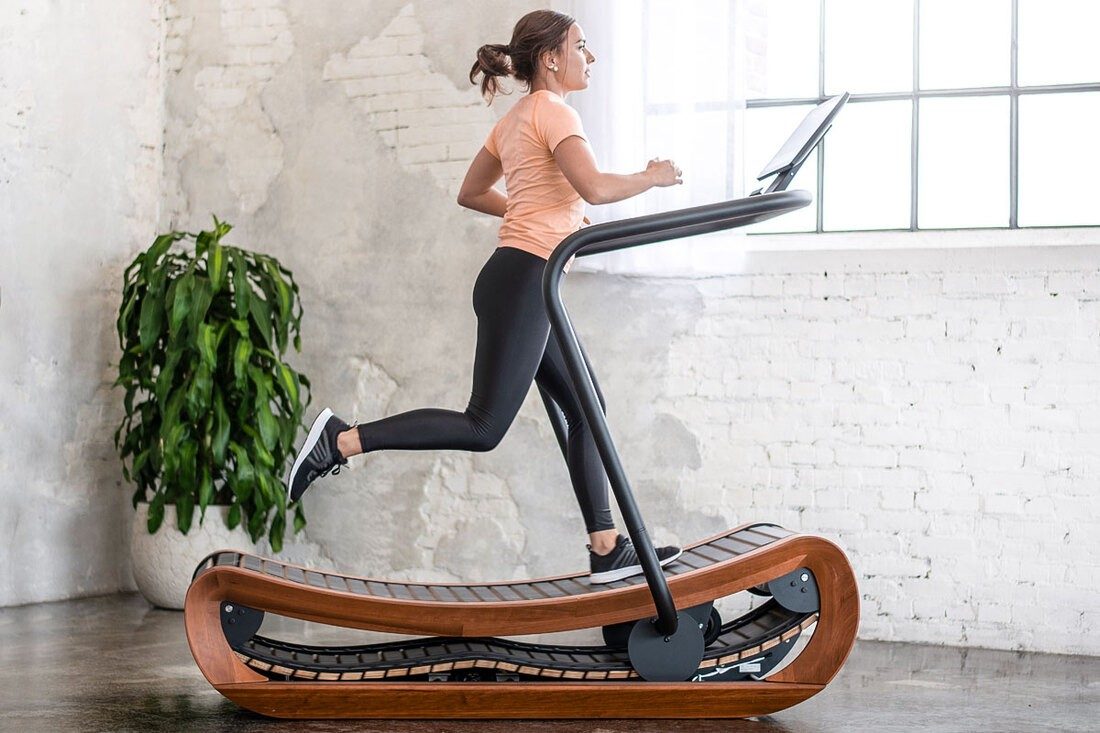 Person running on a curved treadmill effortlessly