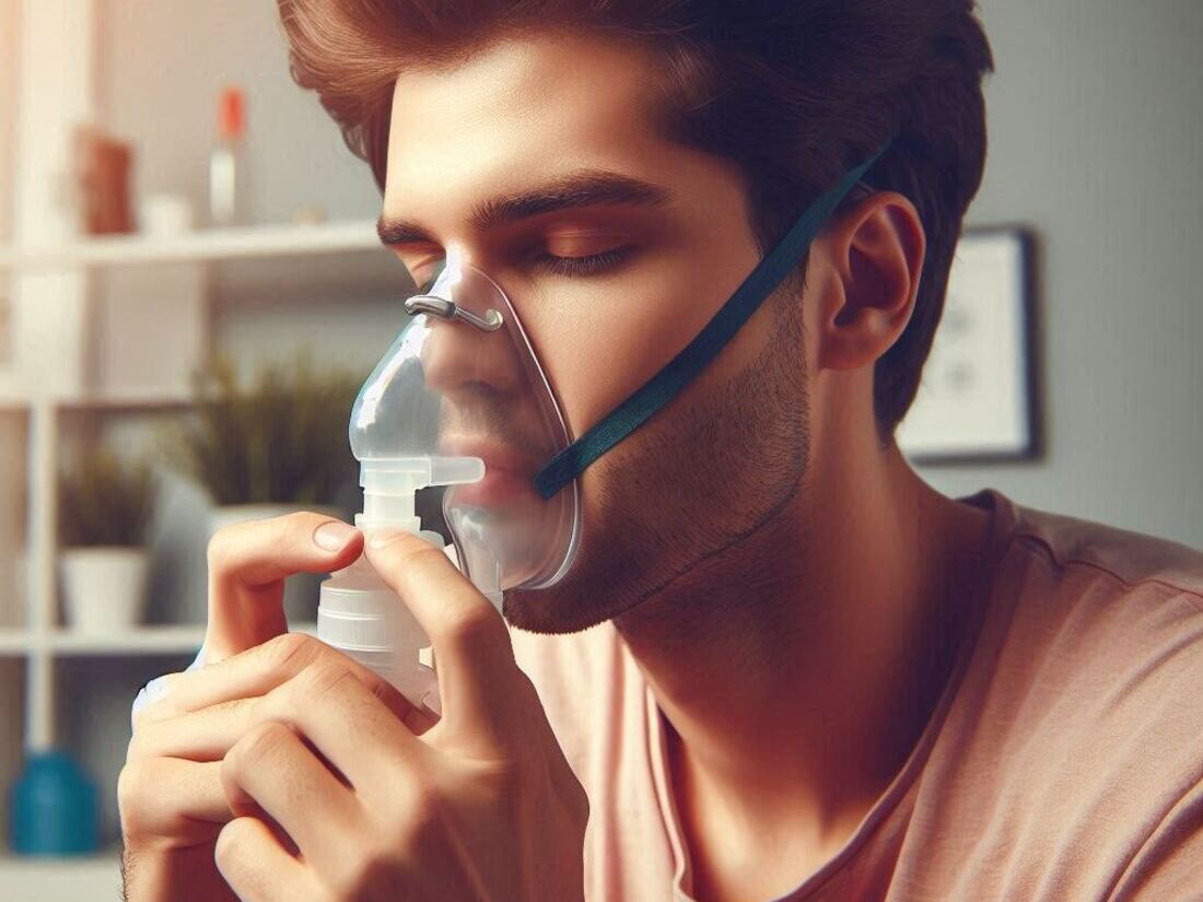 Person using a nebulizer treatment mask