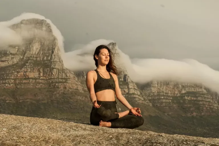 Serene landscape with a person meditating