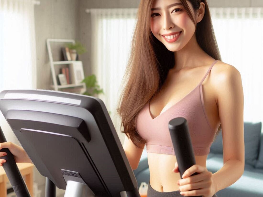 Woman enjoying a low-impact workout on an elliptical trainer at home