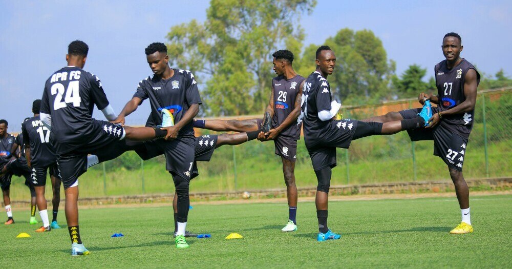 Group of athletes performing balance exercises