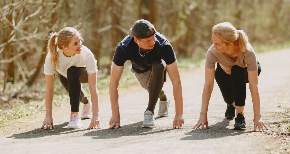 Happy Sports People Getting Started To Run